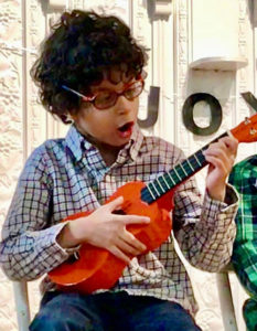 Kathy Stinson's grandson Daniel playing the ukulele